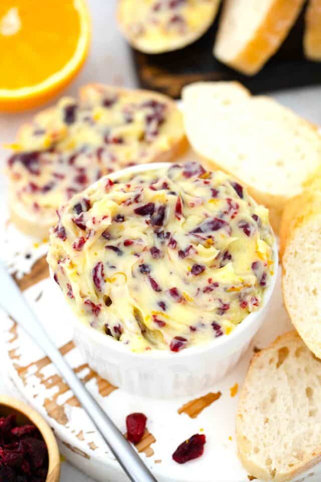 a small bowl of cranberry honey butter with orange zest