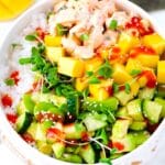shrimp sushi bowl with avocado cucumber salad mango