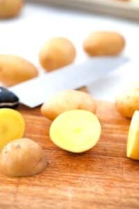hailed potatoes on a cutting board