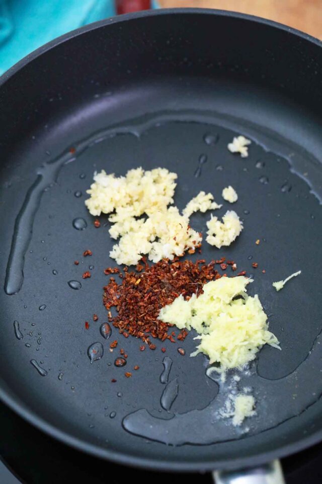 sautéing aromatics in a pan