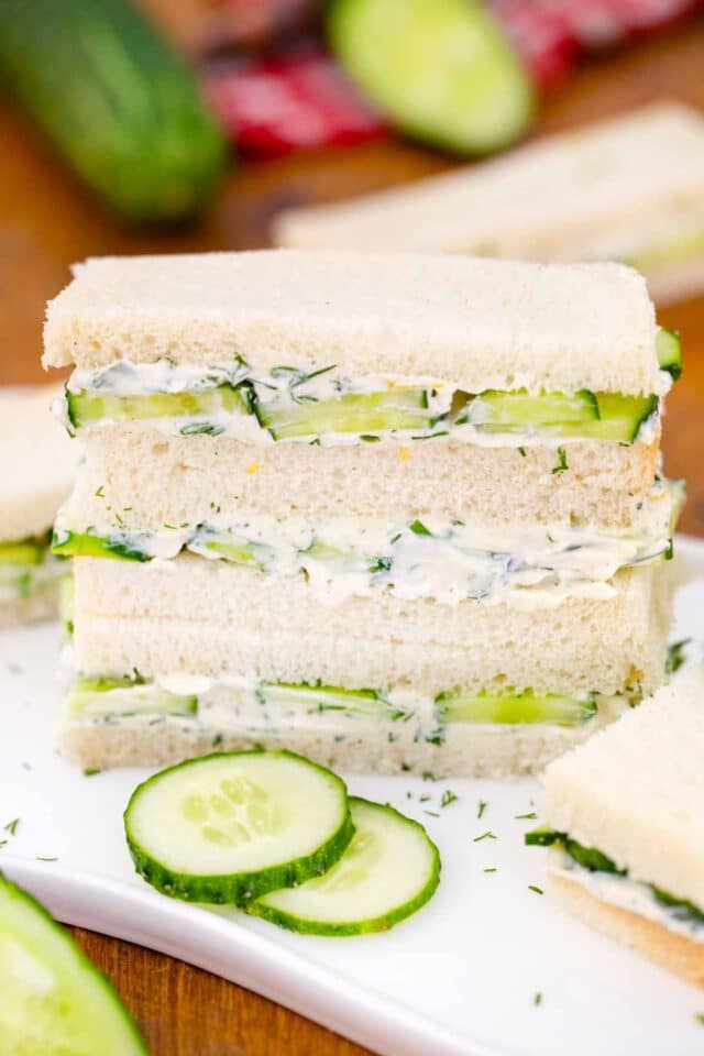 a stack of cucumber sandwiches