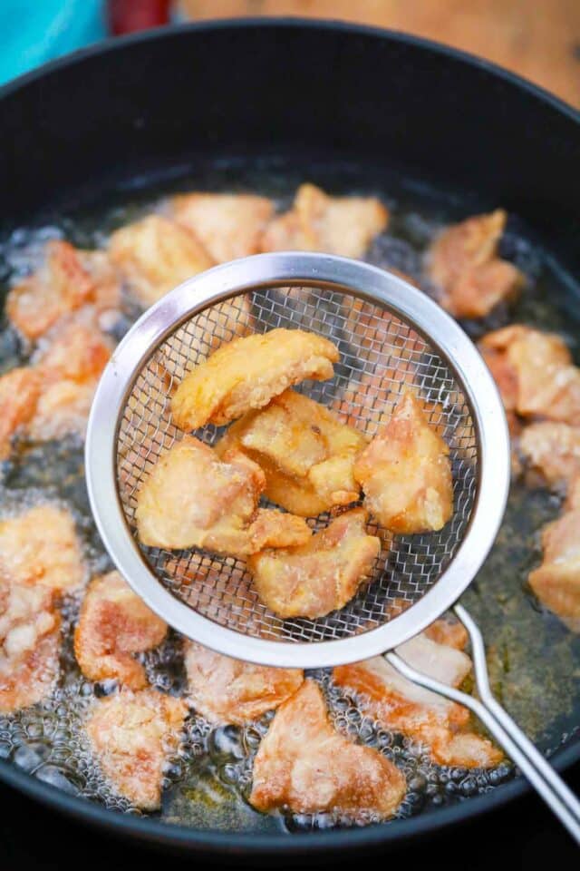 frying chicken pieces in oil