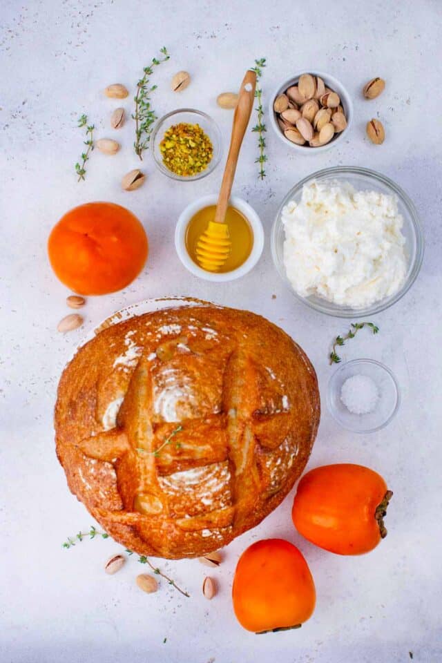 persimmon toast ingredients in bowls on a table