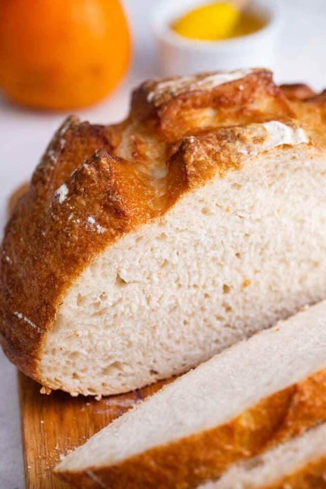 slicing sourdough bread