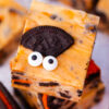 Orange Halloween Oreo fudge with eyeballs.
